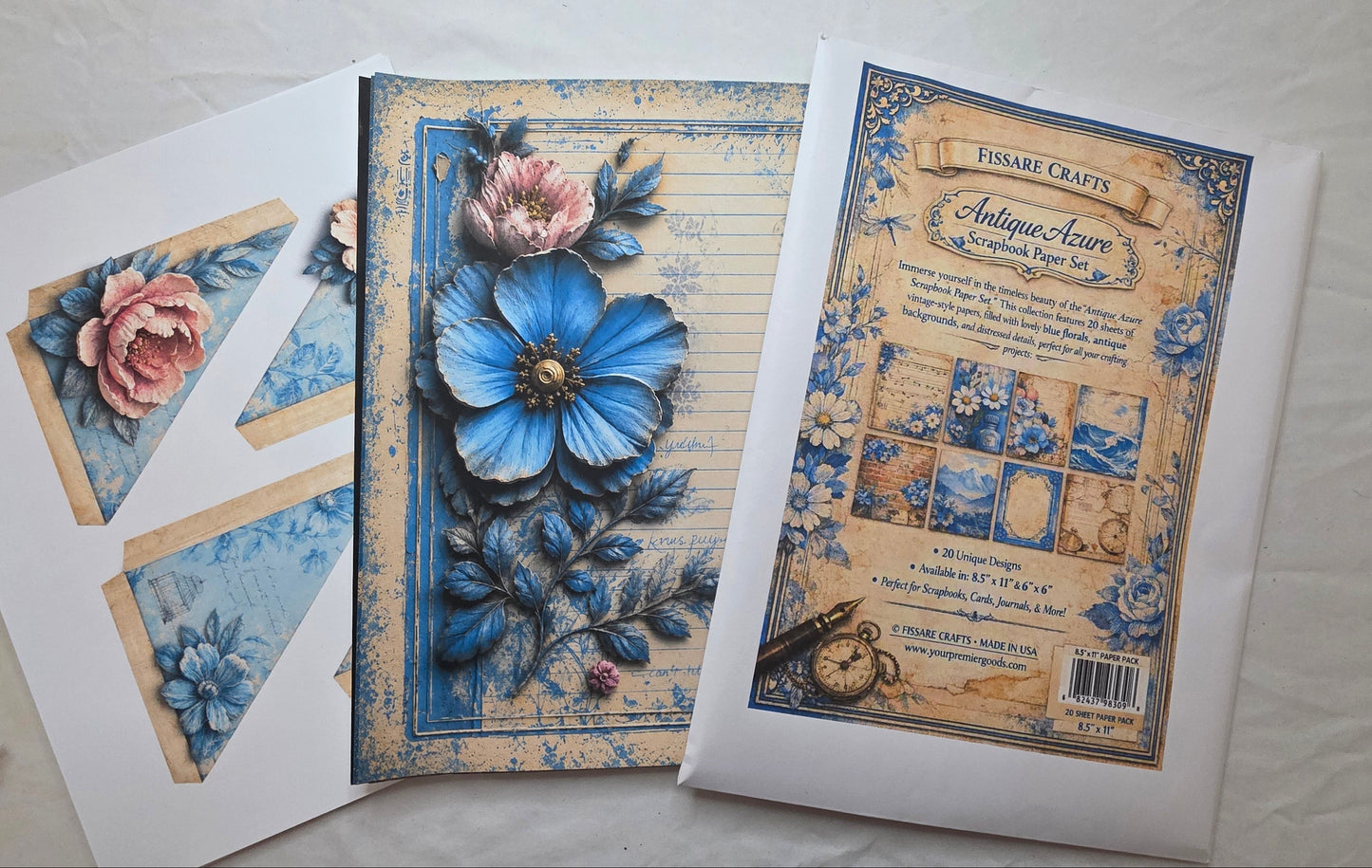 Floral design paper pack with decorative elements on a light gray background