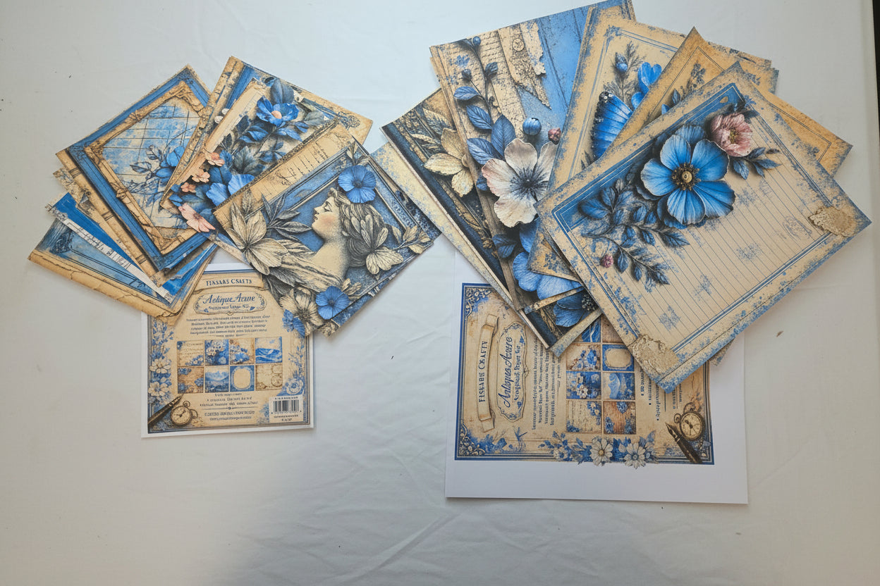 Collection of decorative greeting cards with floral designs on a light surface