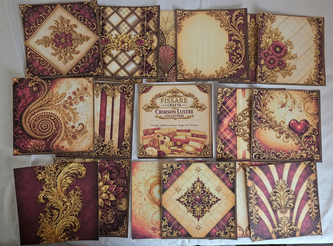 A set of vintage-style decorative cards or paper squares arranged on a white fabric background. The designs feature ornate baroque patterns, paisley, plaid, floral motifs, and one central card with the text 'Fissure Card Collection' and 'Correspondence Card Set'.