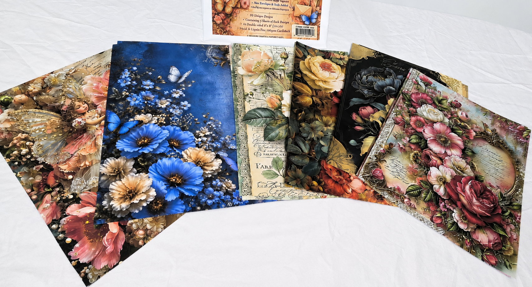 Collection of floral and nature-themed postcards on a white surface