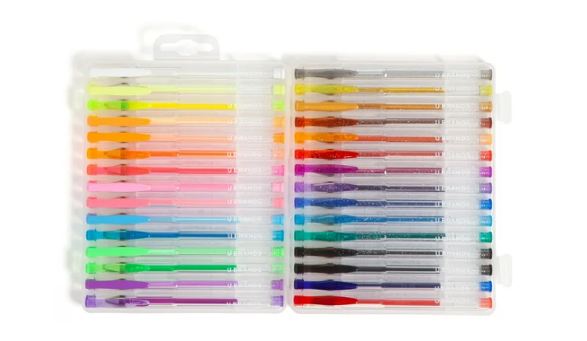 Set of colorful markers in a clear plastic case on a white background