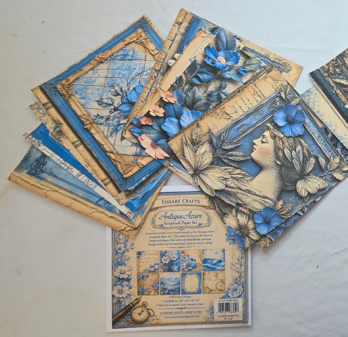 6x6  Antique Azure Scrapbook paper fanned out in a display